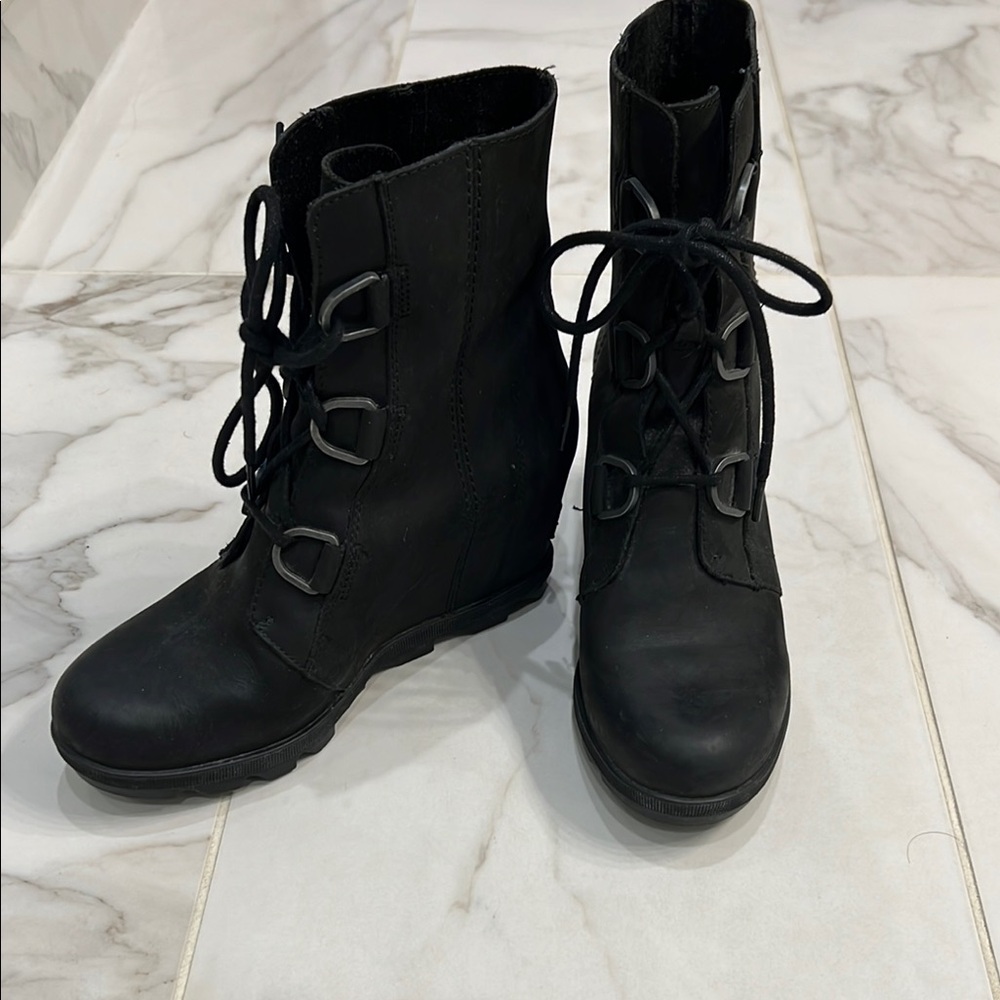 Sorel Joan Of Arctic Black Lace Up Wedge Boots with Matte Finish